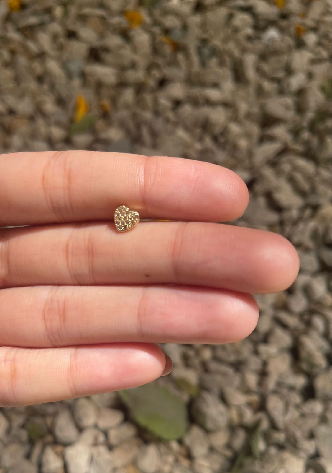 Gold Heart Ear piercing